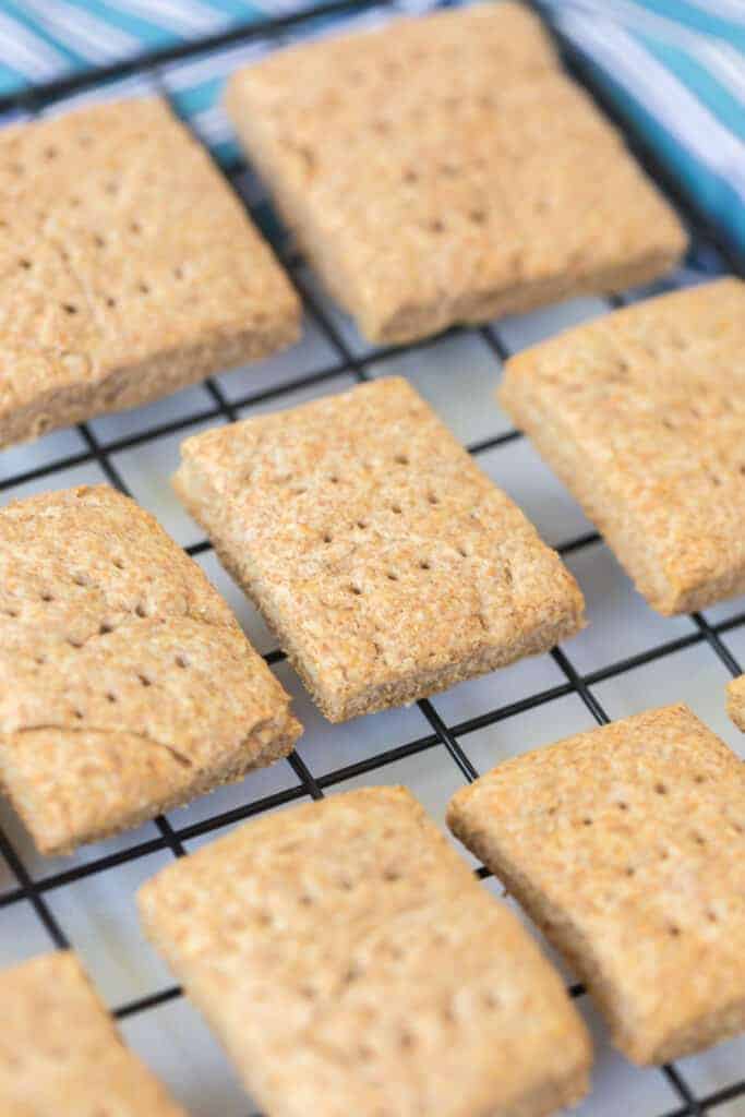 close up of homemade rustic graham crackers on a cooling rack