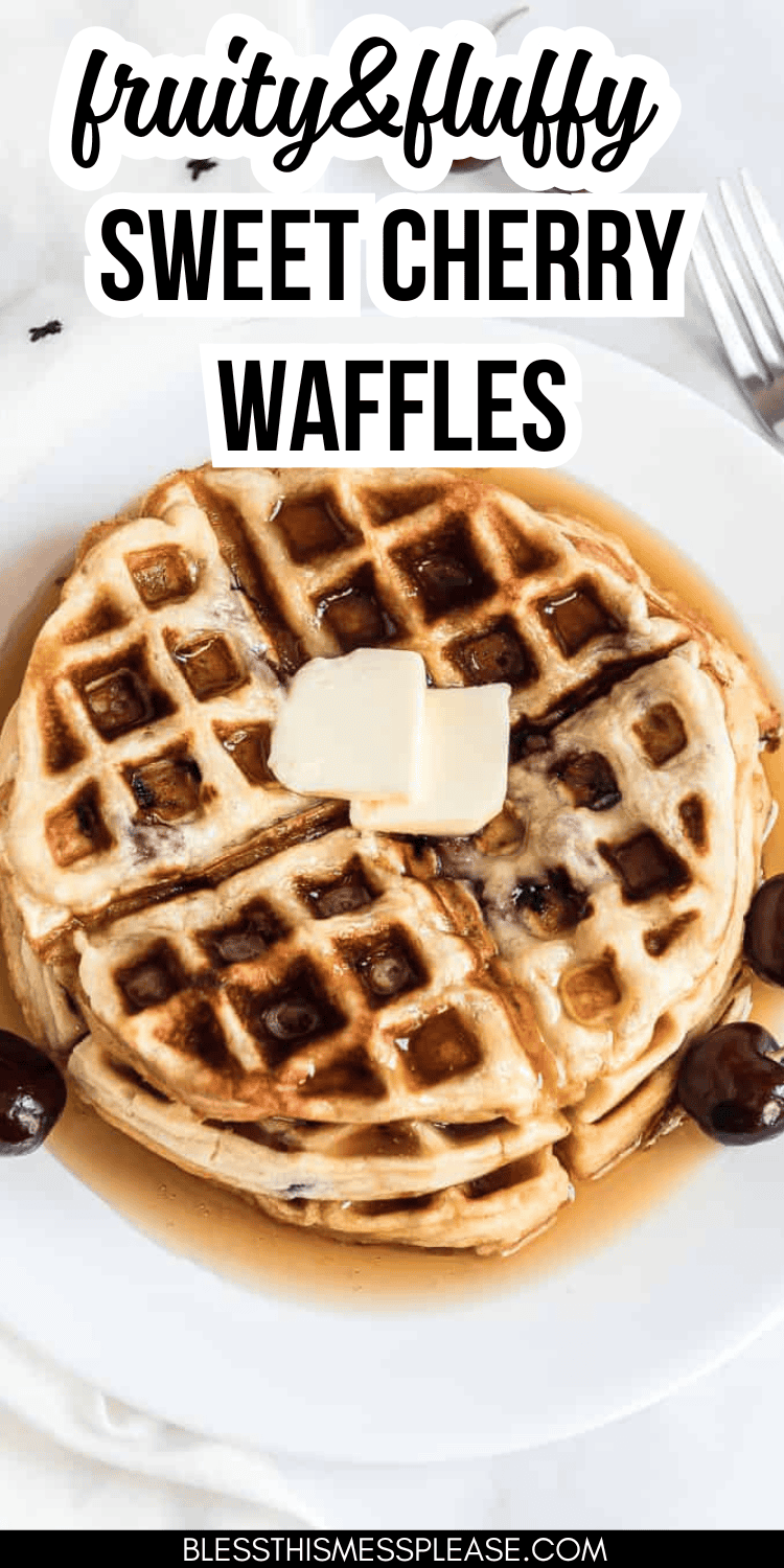 A plate of fruity and fluffy cherry waffles topped with butter and maple syrup. The text reads sweet cherry waffles. A few cherries are scattered around the delicious creation.