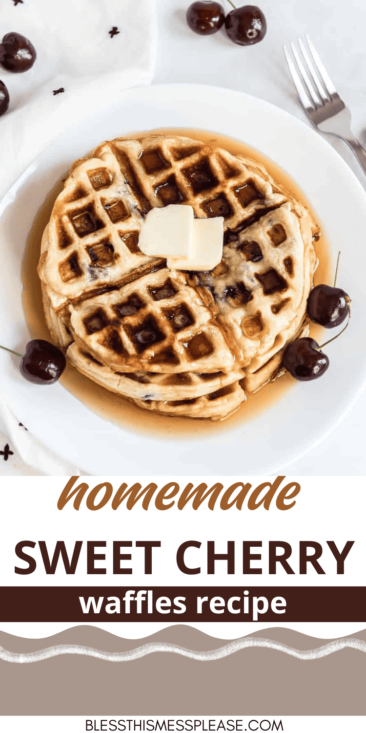 A white plate with stacked cherry waffles topped with a pat of butter and drizzled with syrup. Fresh cherries are scattered around the waffles. In the background, a fork and napkin rest alongside more cherries. Text reads, homemade sweet cherry waffles recipe.