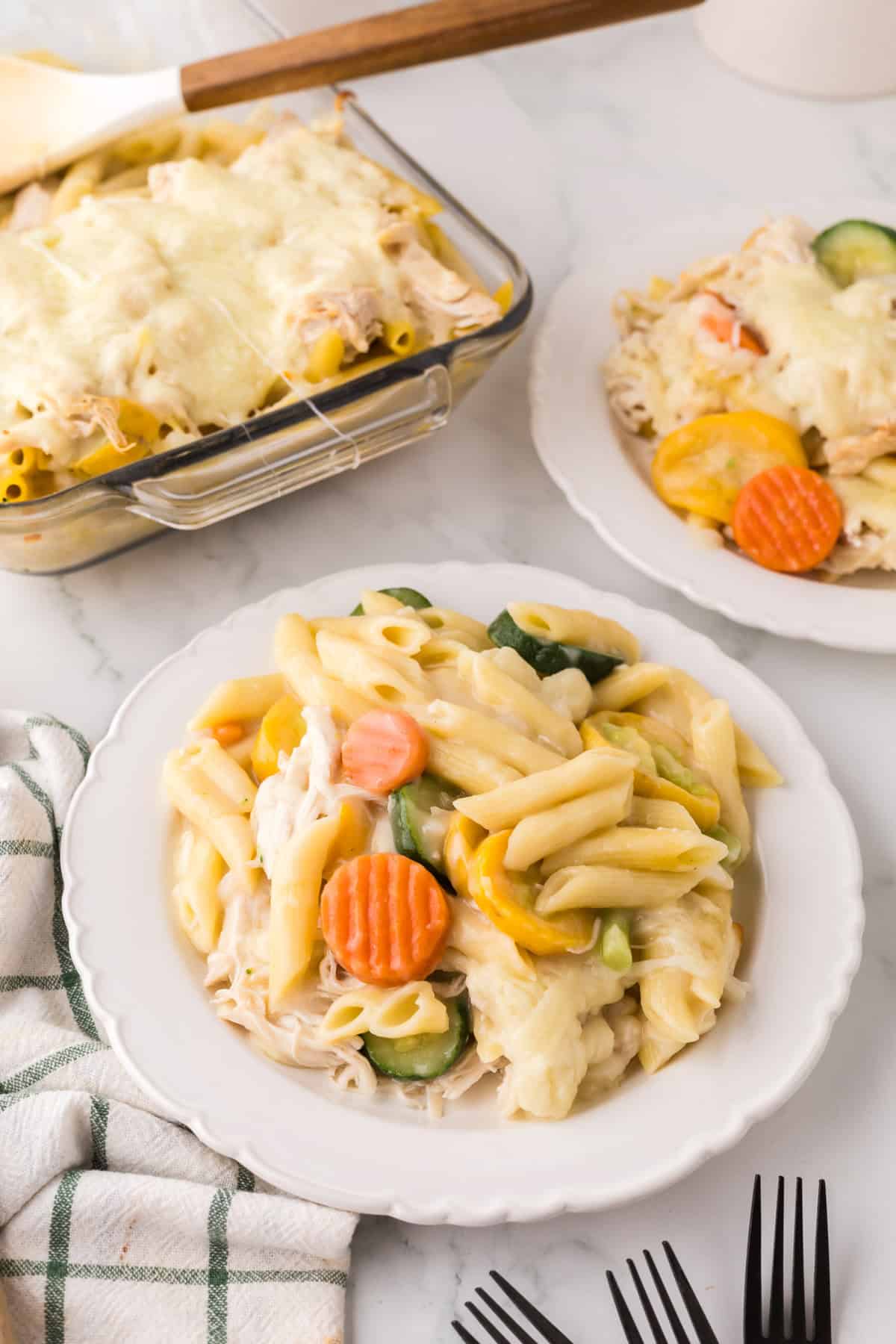 Chicken and veggie bake in a white bowl.