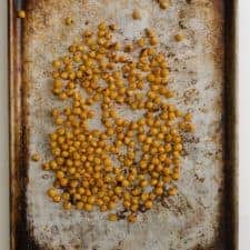 Easy Roasted Chickpeas are a great snack to eat right off the pan, or to store in the fridge as part of your weekly meal prep!