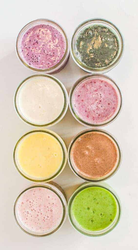 top view of 8 mason jars with smoothies
