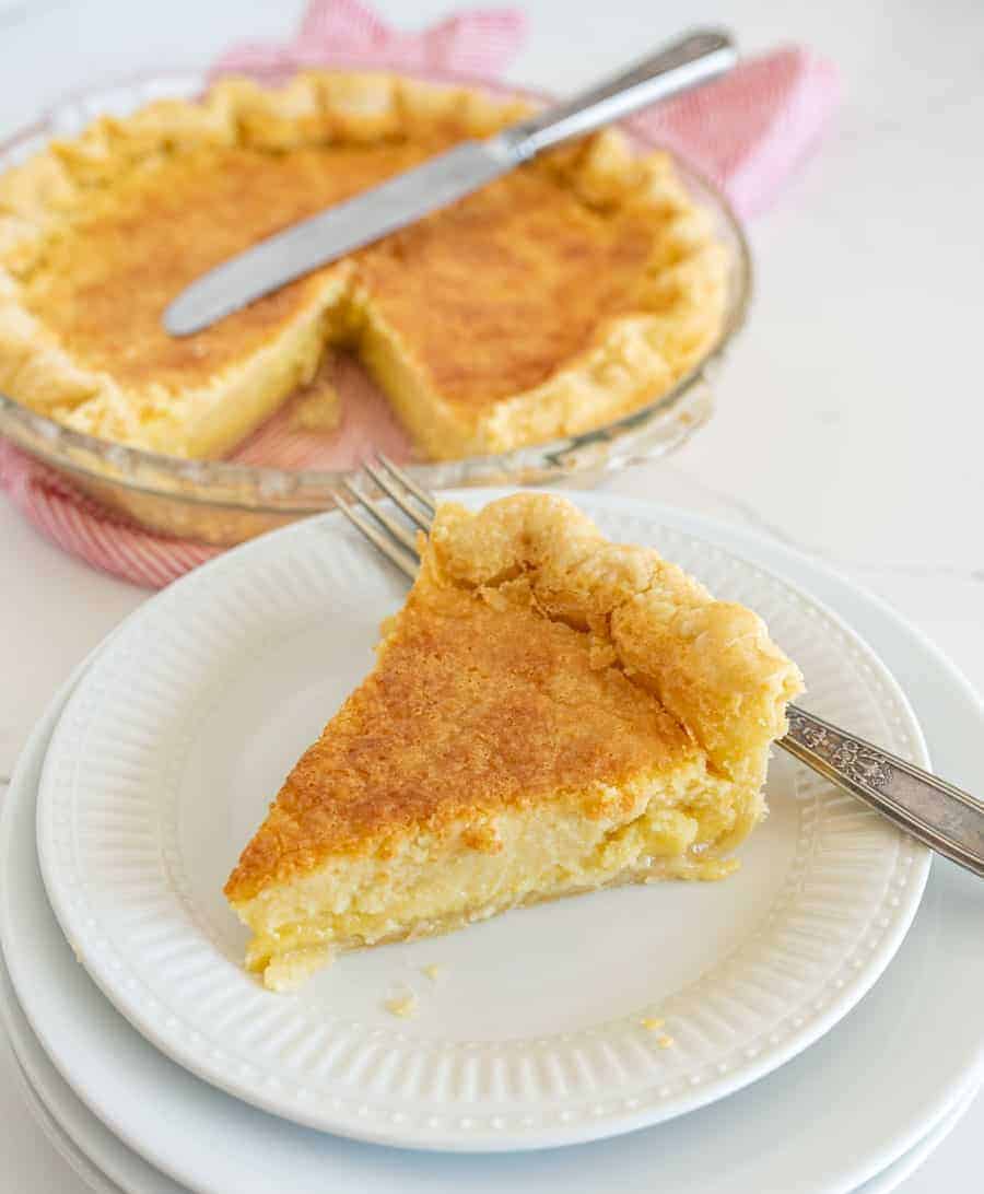 slice of buttermilk pie on a plate.