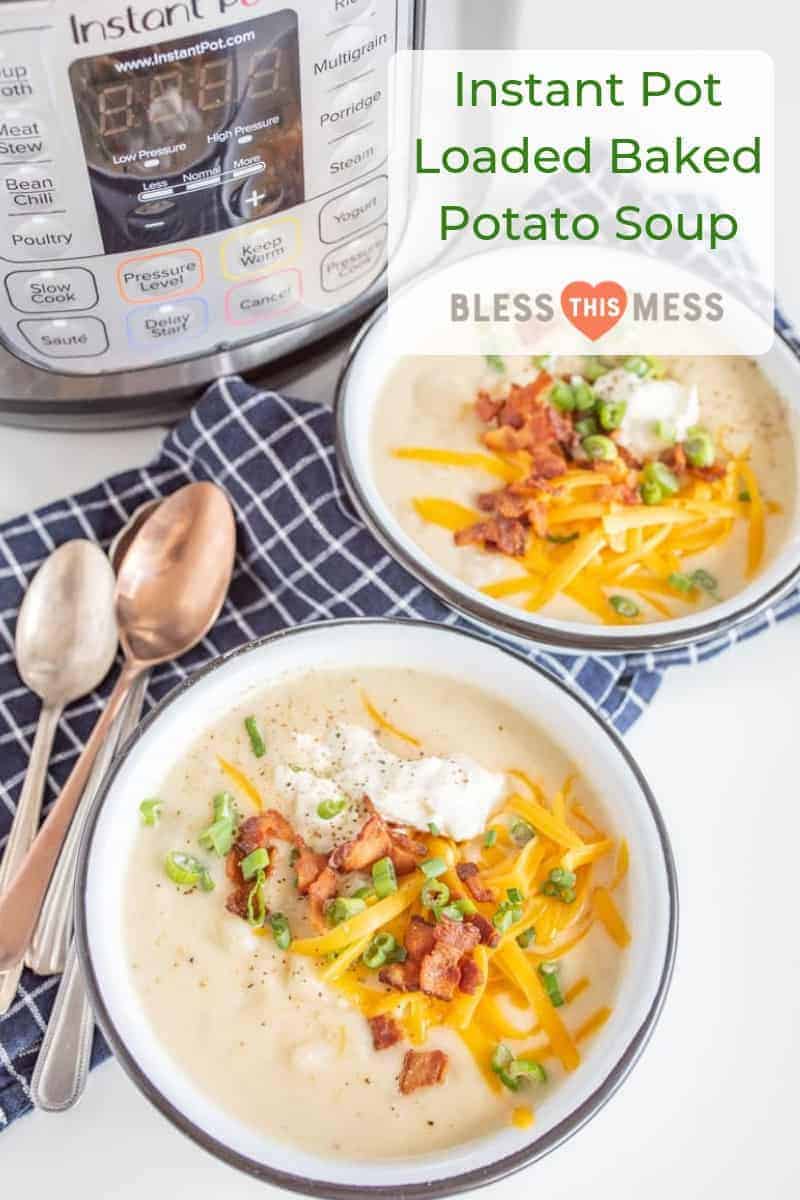 potato soup in white bowls with yellow cheddar cheese, sliced green onions, bacon bits, and sour cream on top sitting on a blue and white towel with spoons beside and instant pot nearby.