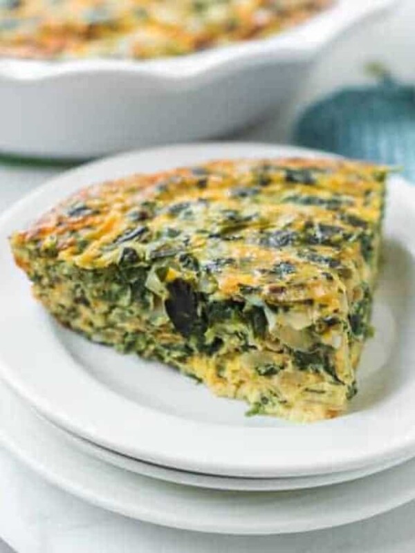 crustless spinach quiche on a white plate