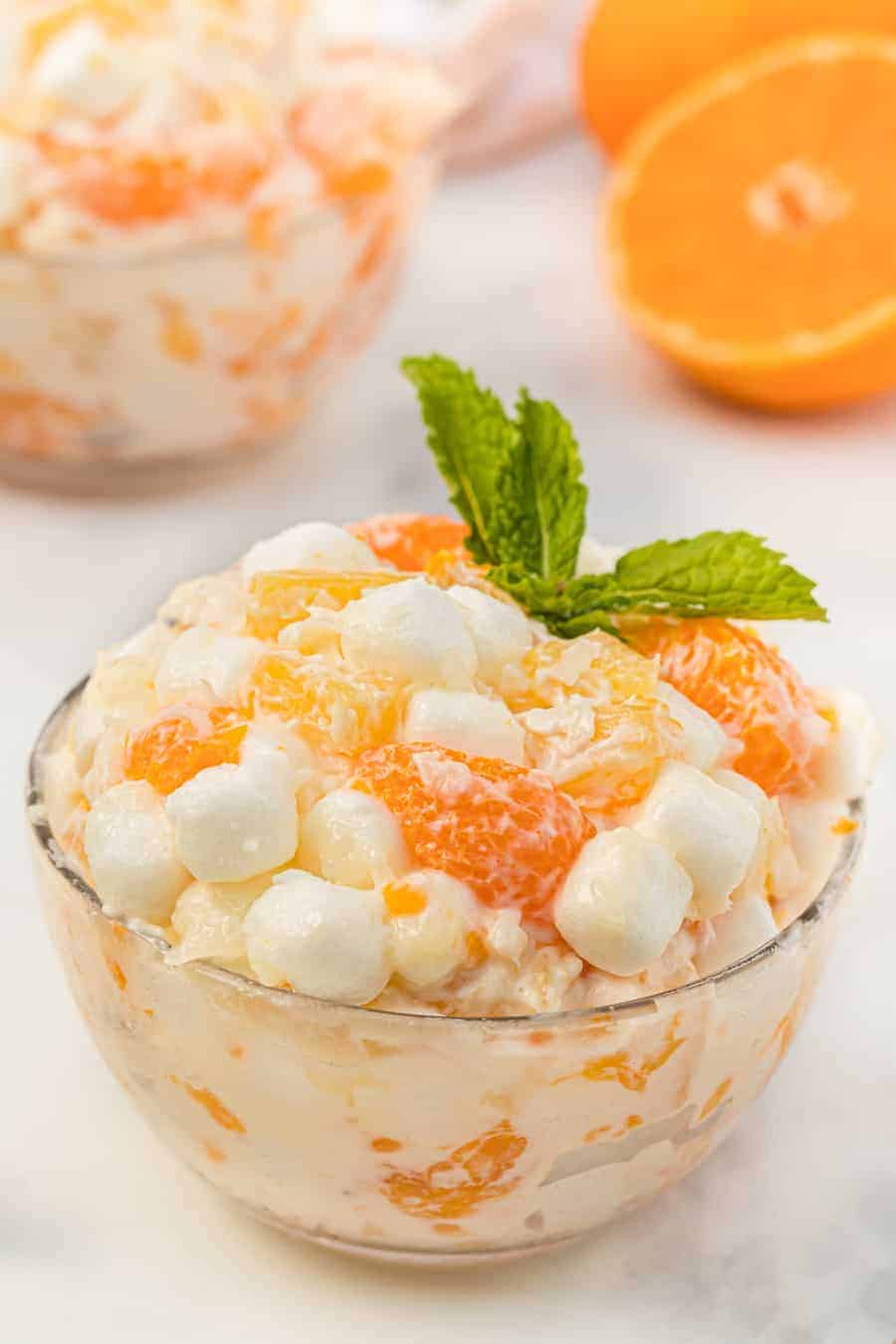 This tasty and creamy 6-cup ambrosia fruit salad is the simplest thing to make and is forever a hit for kiddos and adults alike at any gathering! 