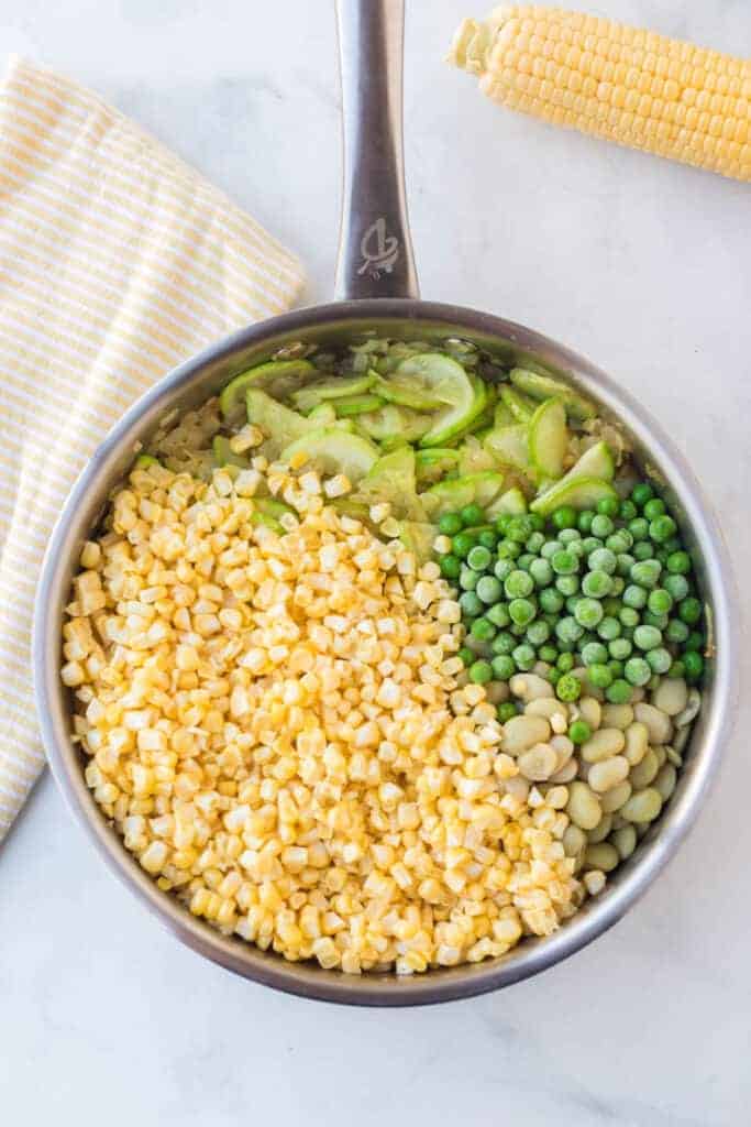 corn and yellow squash side dish in a pot