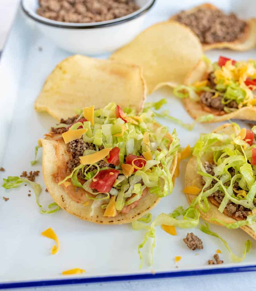 beef tostadas on a white plate