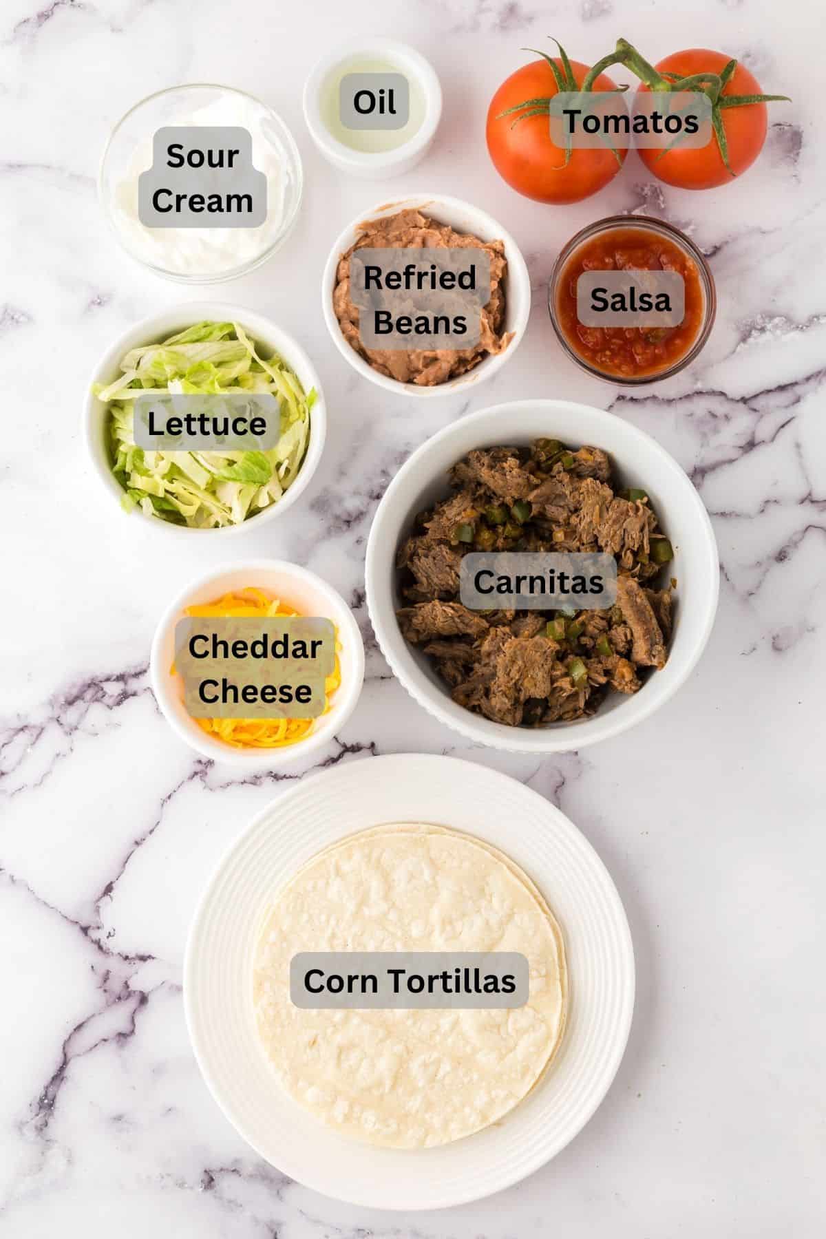 portion bowls each with raw ingredients to make Mexican beef tostado recipe.