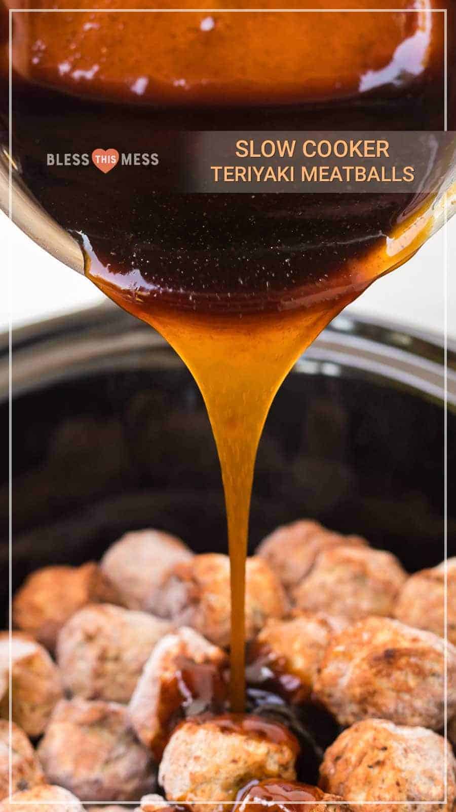 honey teriyaki sauce being poured over meatballs in a black crockpot.