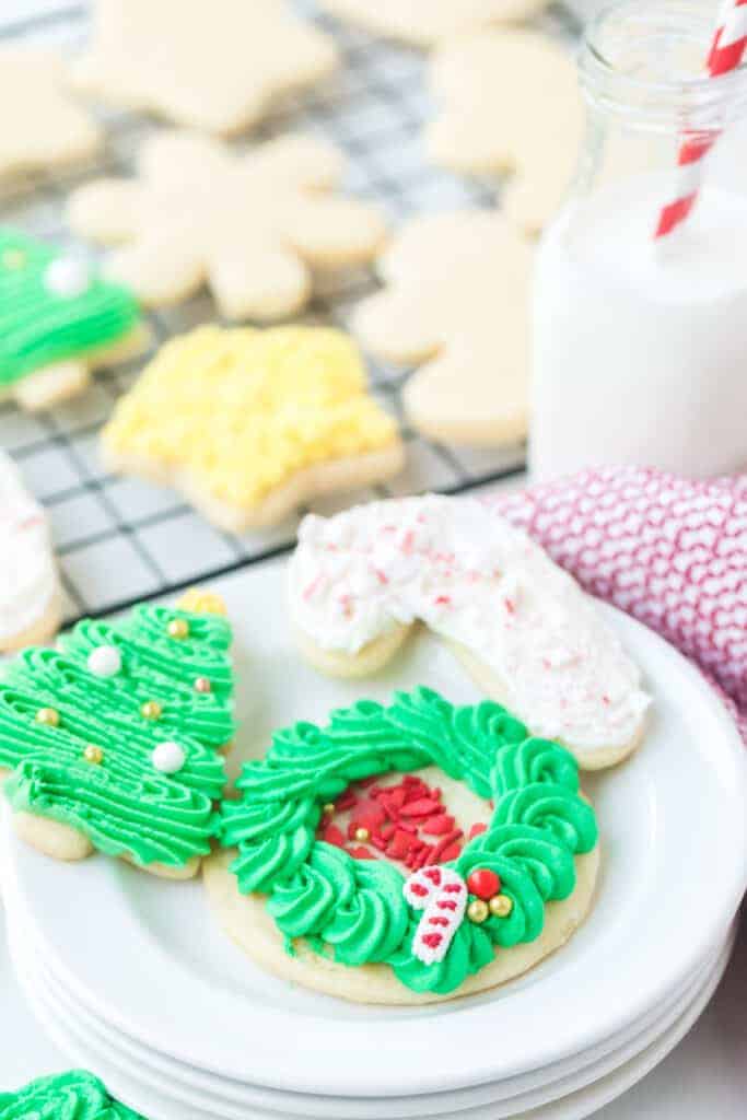 plate of iced sugar cookies decorated for christmas