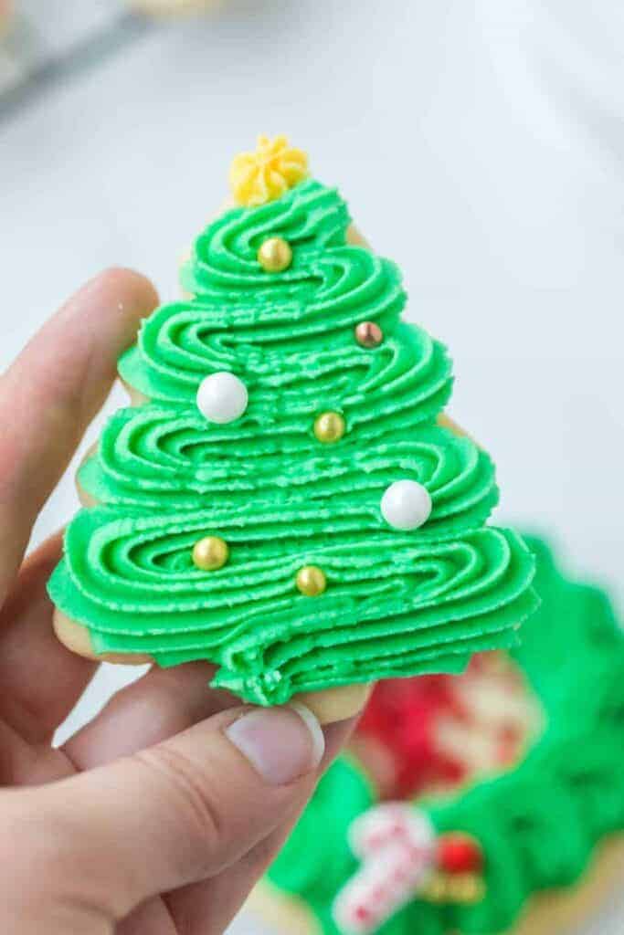 iced sugar cookie decorated like a christmas tree