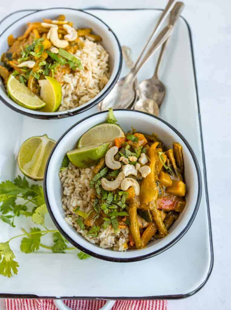 two bowls of easy vegetable curry with spoons