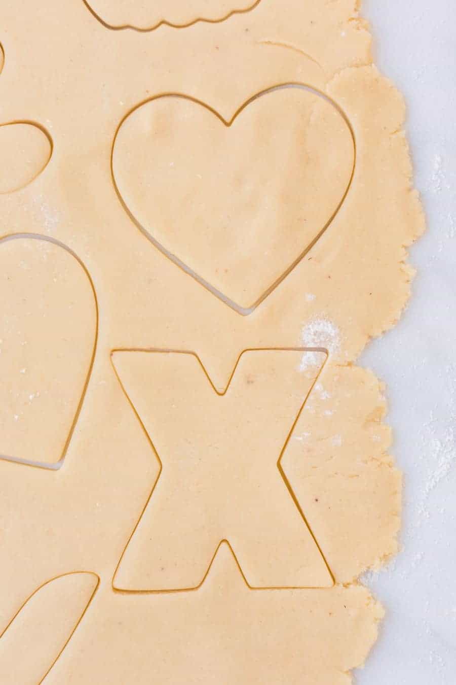 cursing out hearts and X's for Valentines day sugar cookies.