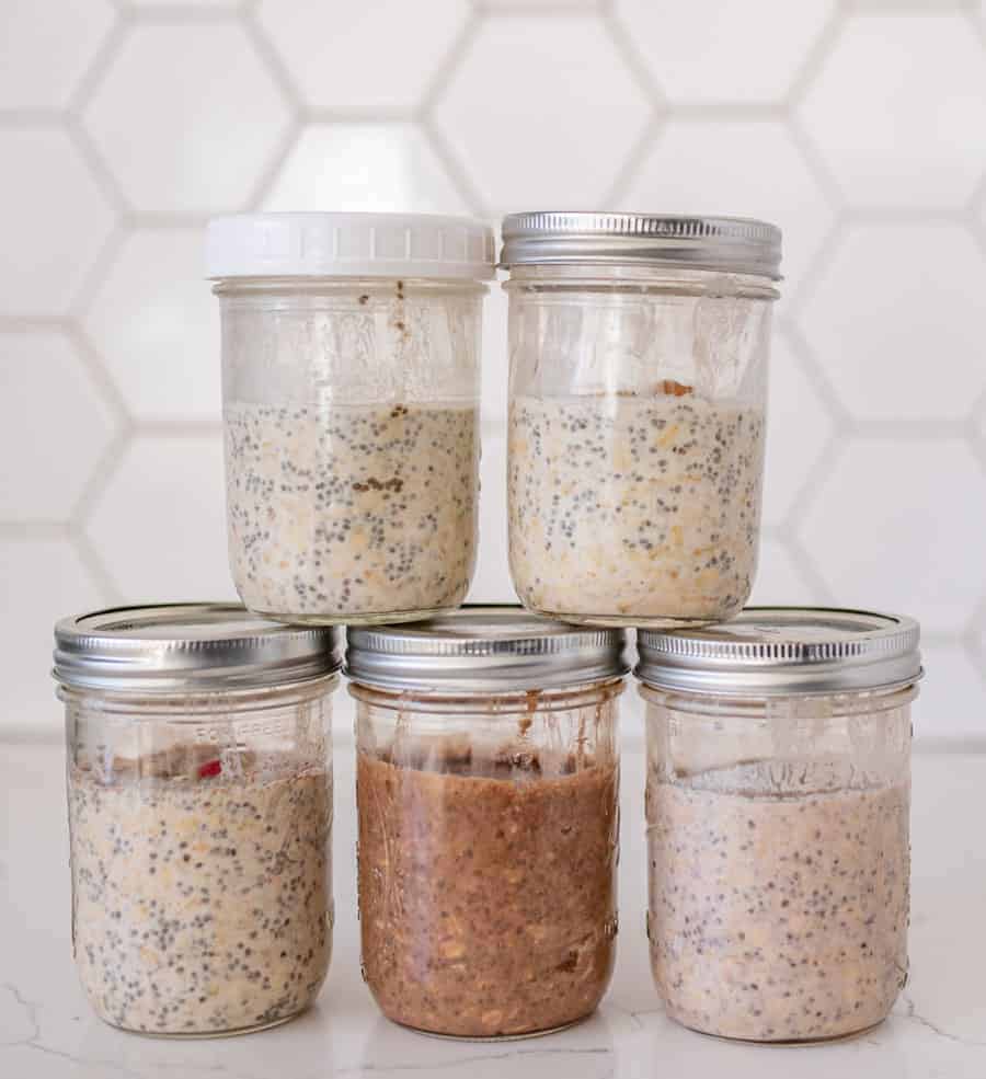 easy overnight oats top view with various flavors side view of various jars