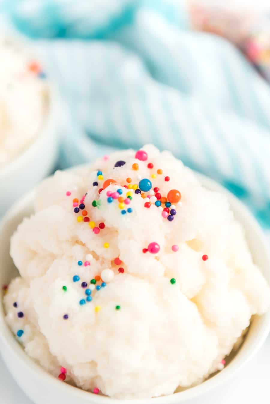snow ice cream in a dish with colored sprinkles.