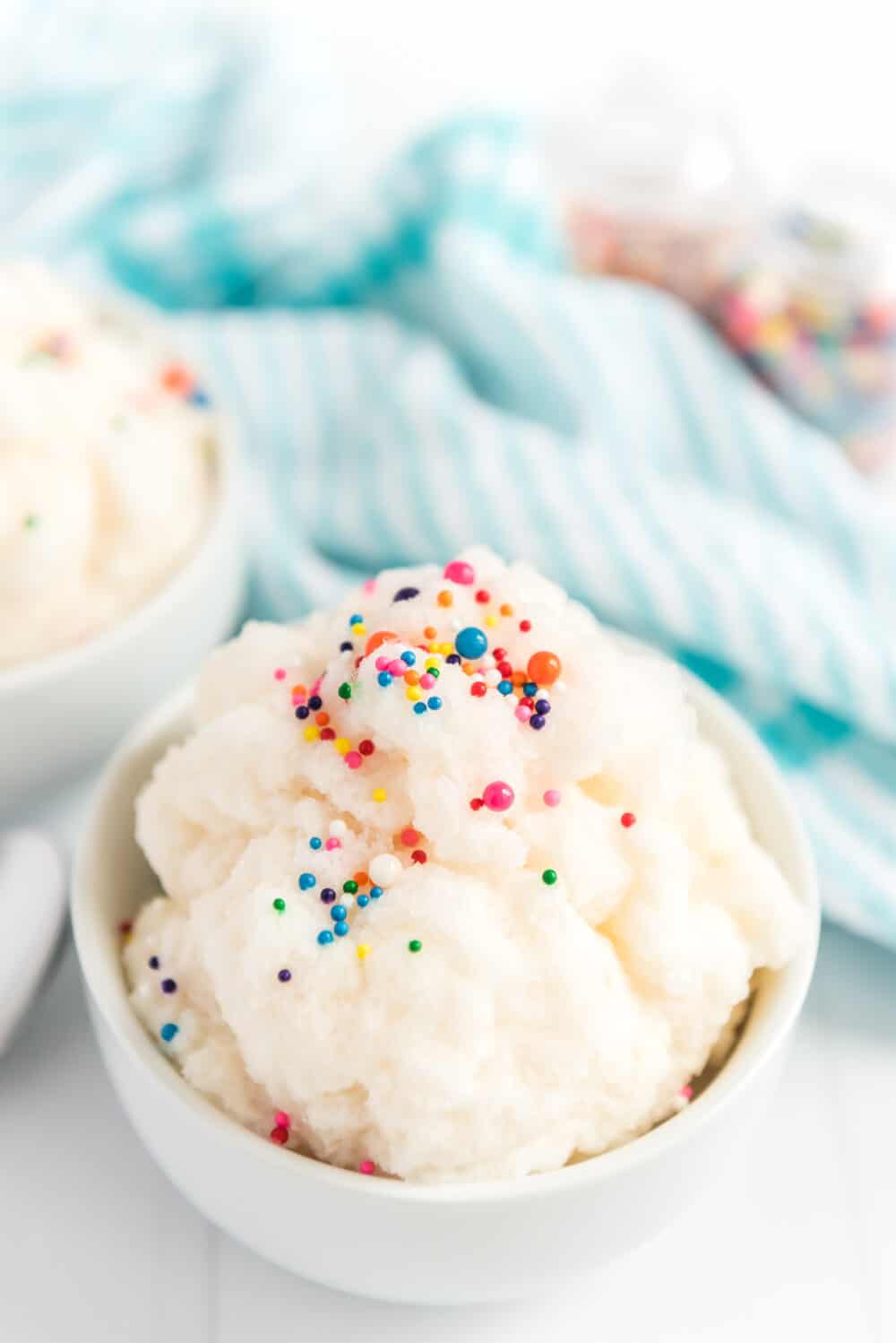 snow ice cream in a dish with colored sprinkles.