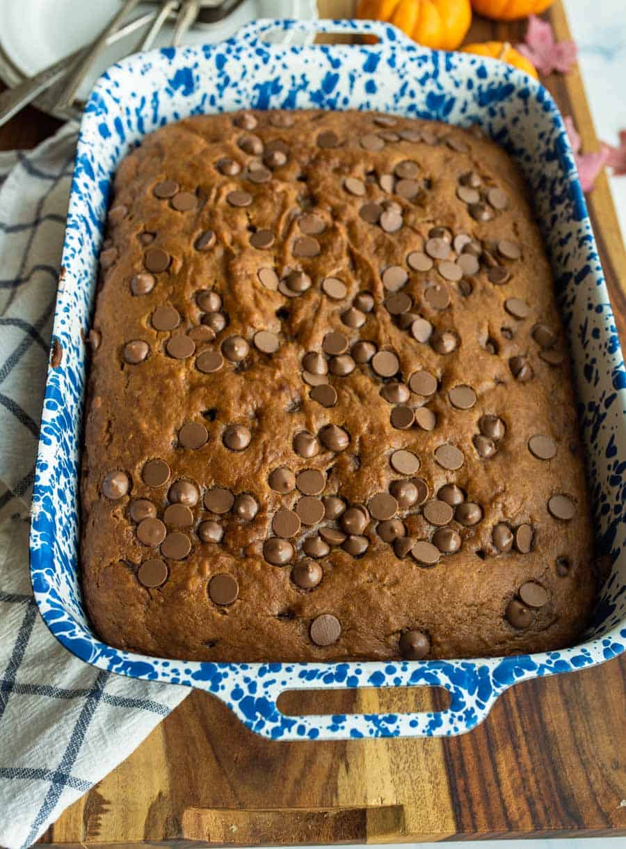 uncake cake in pan with chocolate chips on top