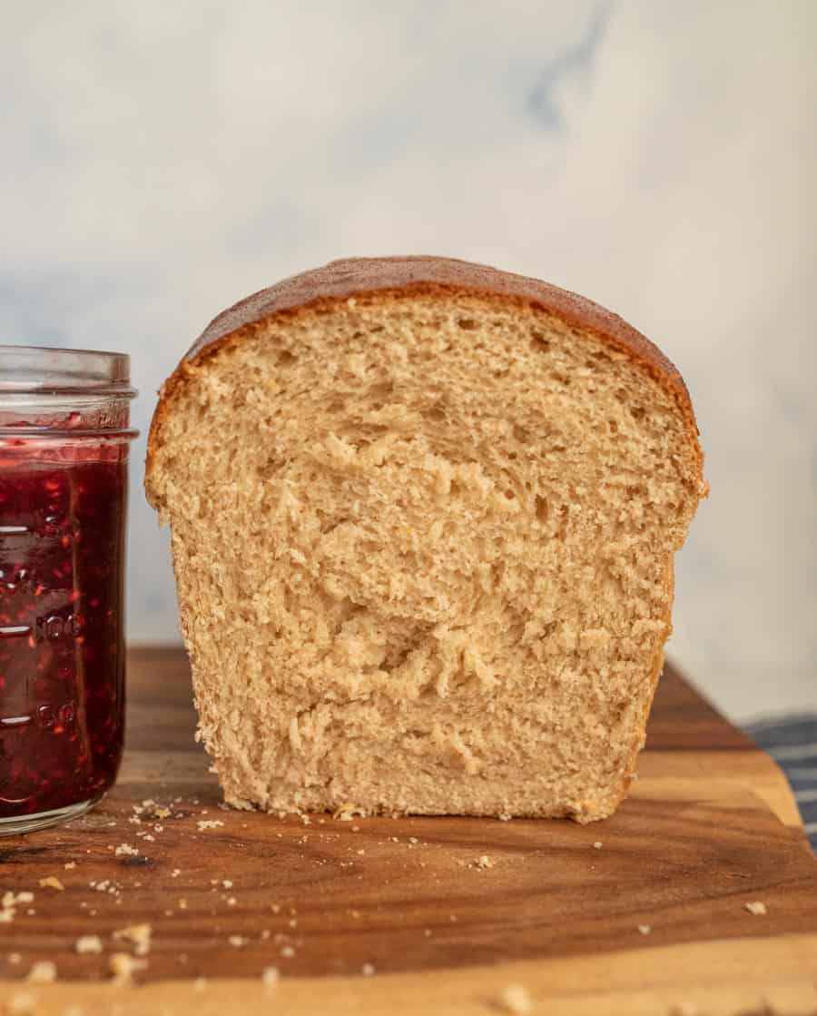 slice missing of whole wheat bread so that you can see the texture of it.