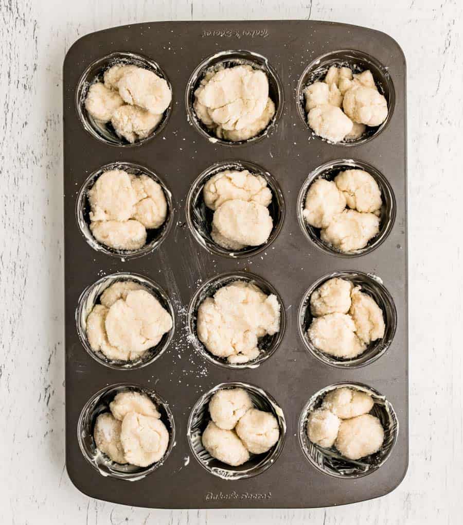 monkey bread muffin batter in muffin tins
