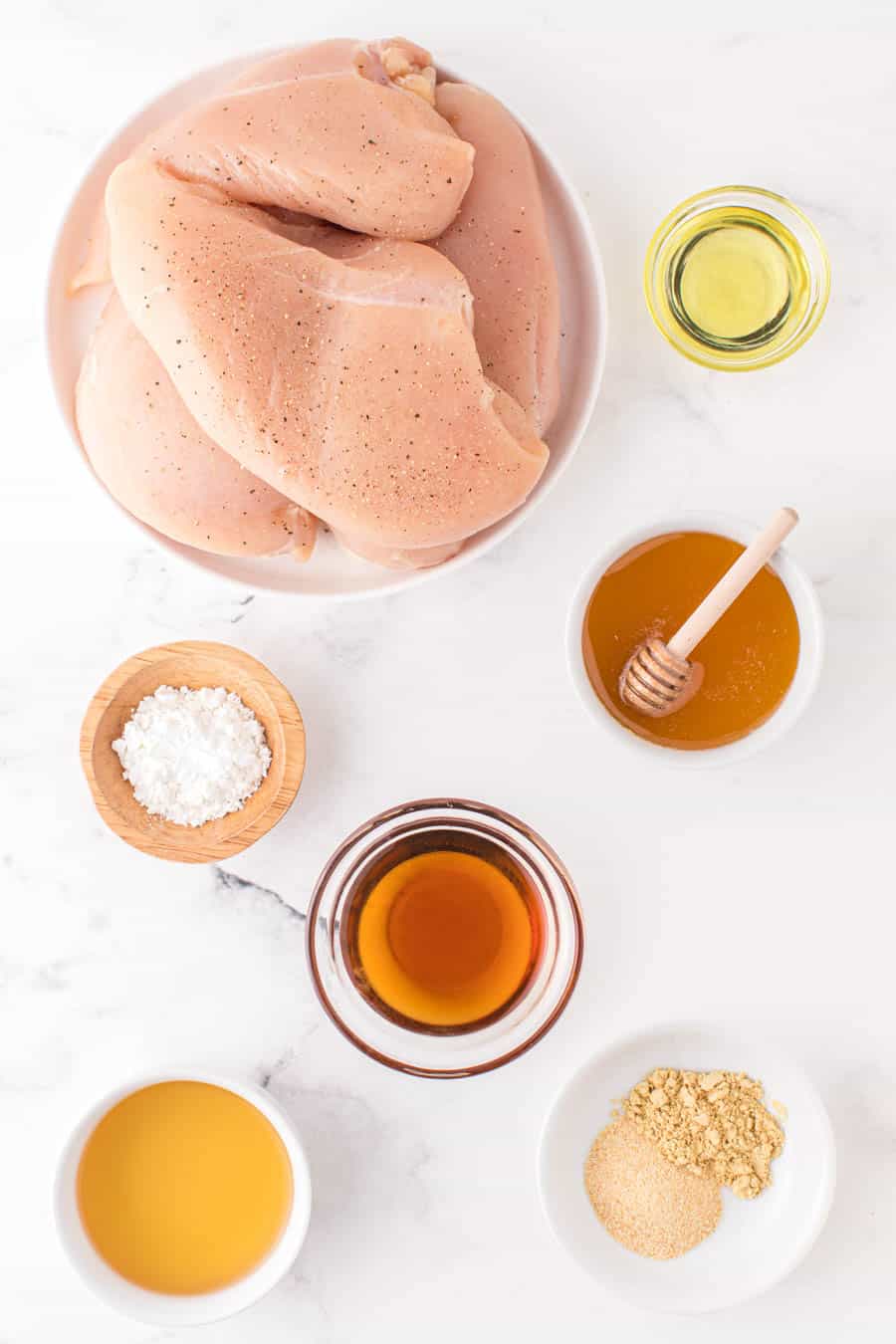 Top view of ingredients for honey sesame chicken. 