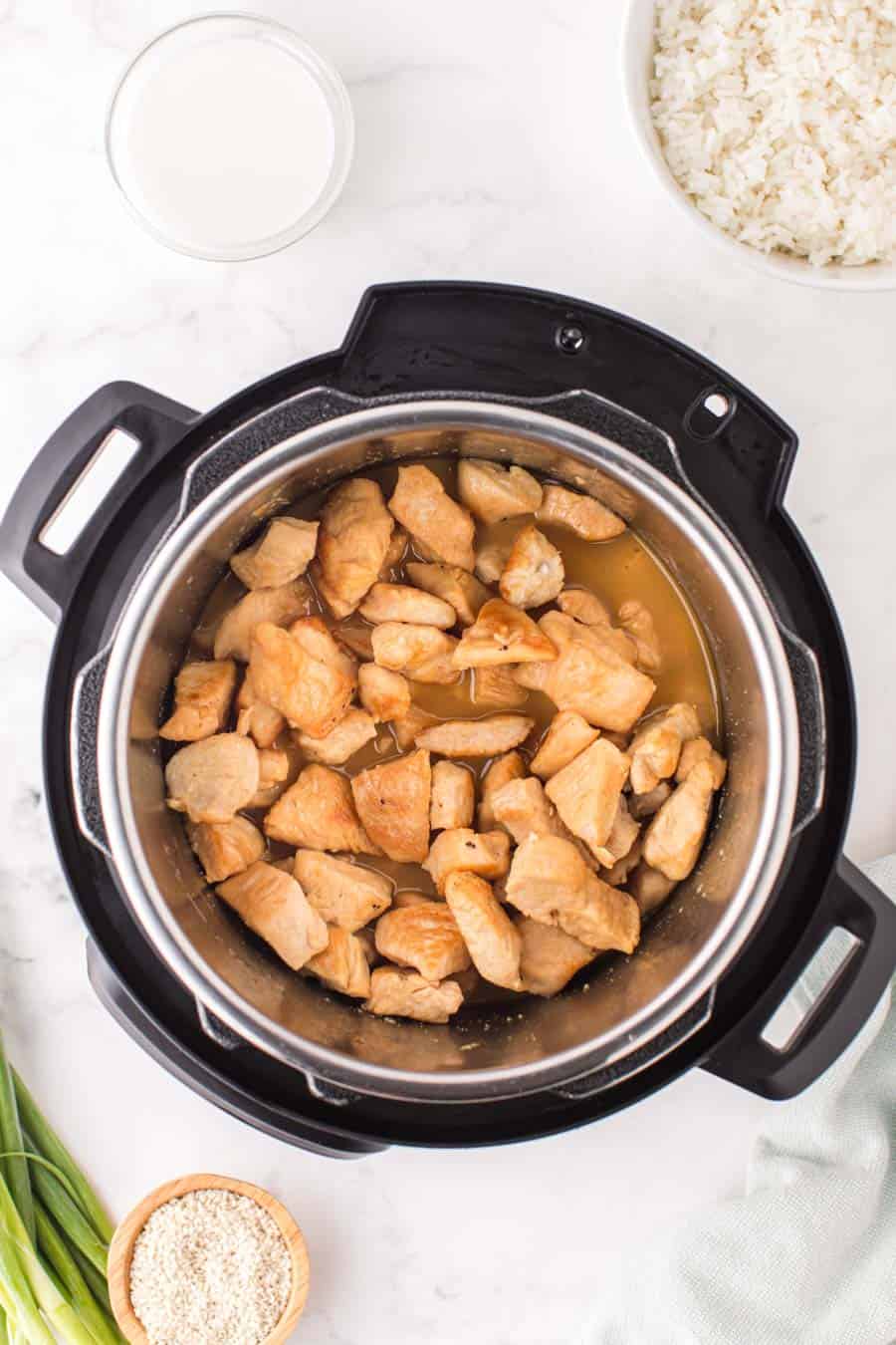 top view of diced chicken in an instant pot