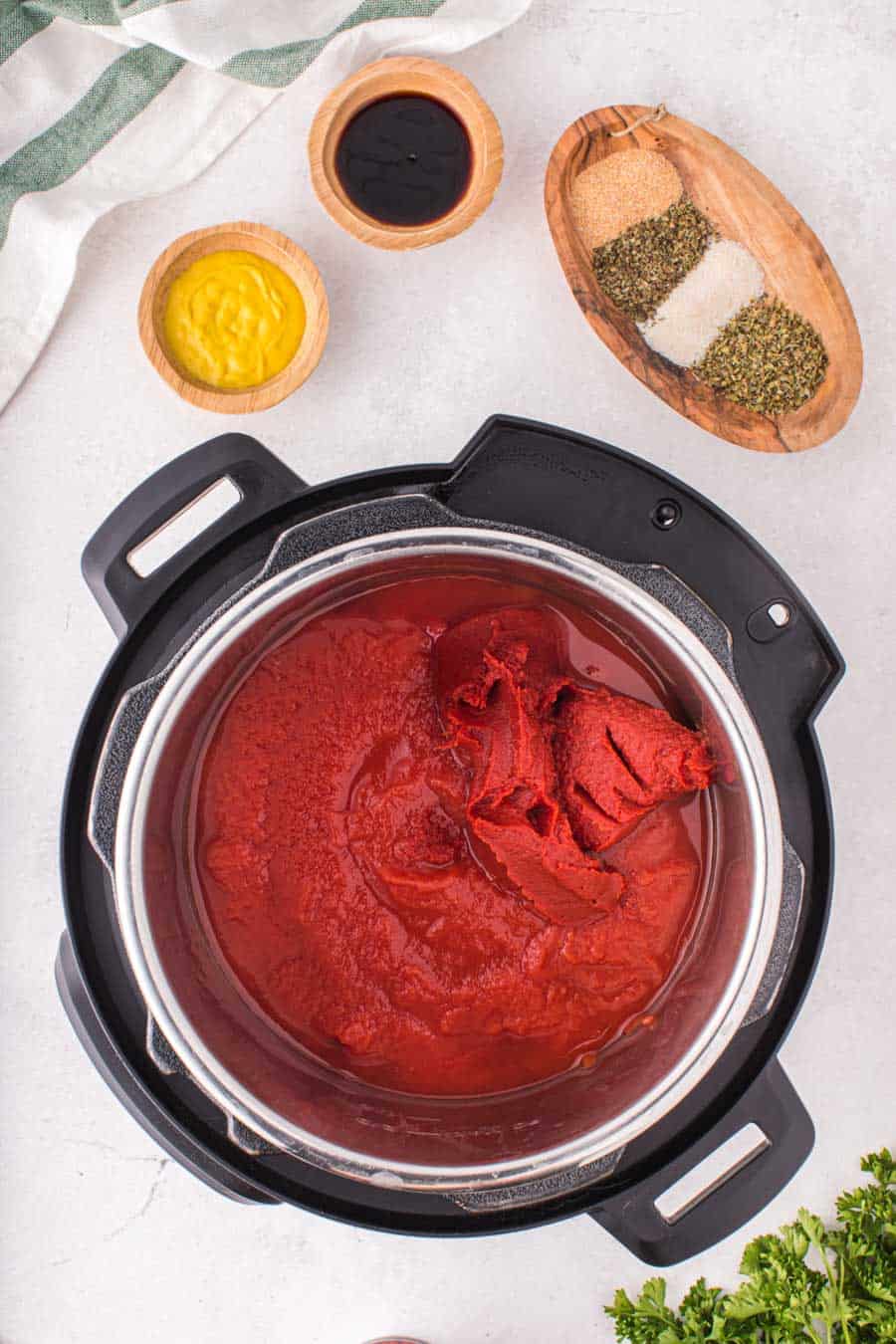 top view of instant pot with red spaghetti sauce