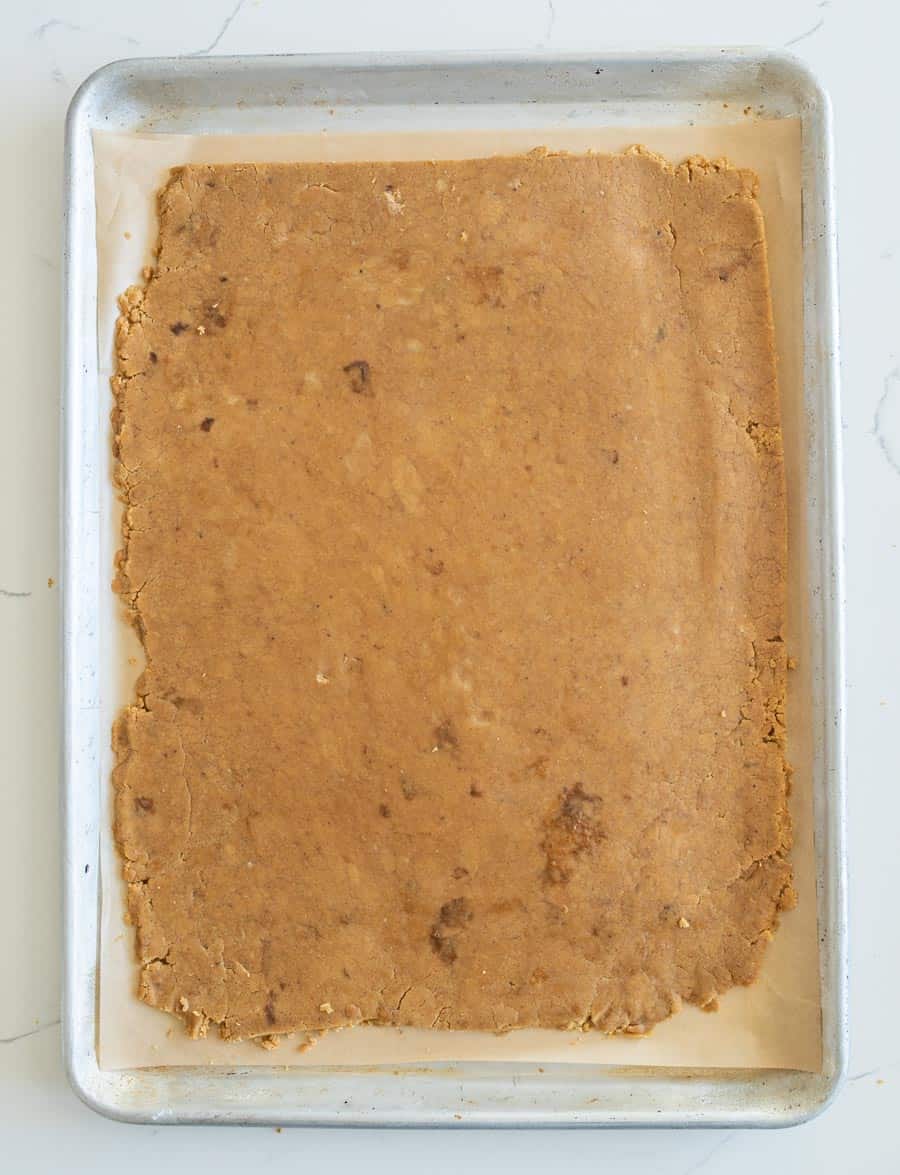 raw gingerbread dough on a sheet pan