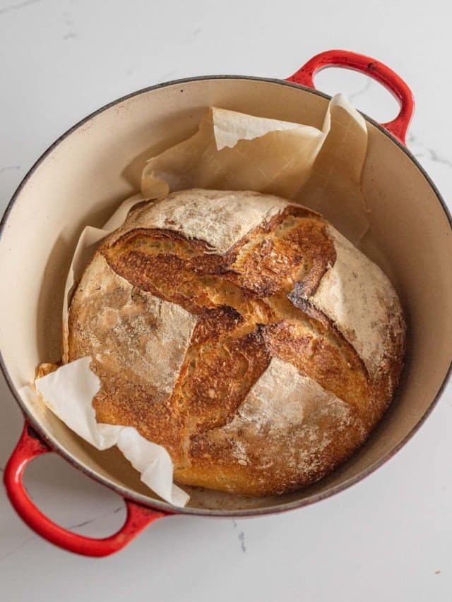 closer up sourdough bread in a dutch oven.