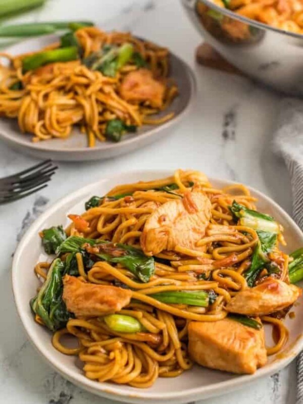 a plate of chicken lo mein