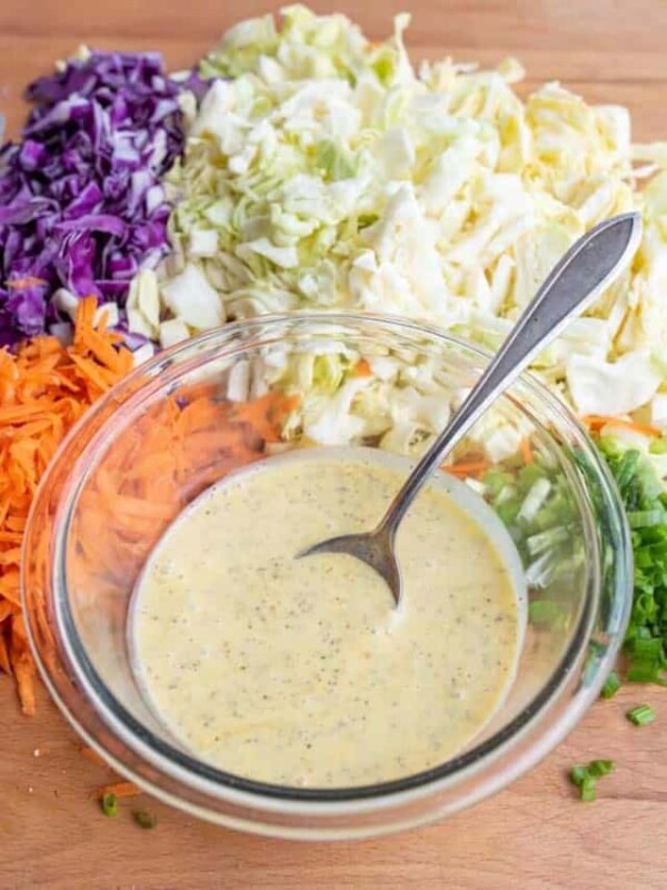 coleslaw dressing in a bowl with a spoon