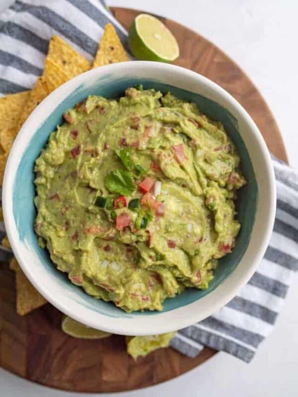 top view of a white and blue bowl with guacamole