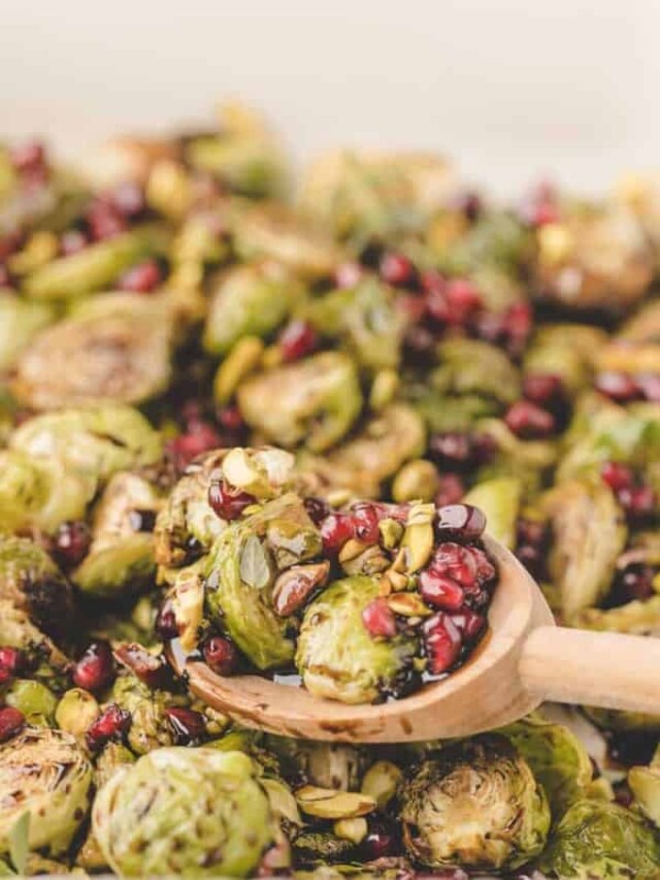 wooden spoon full of roasted Brussels