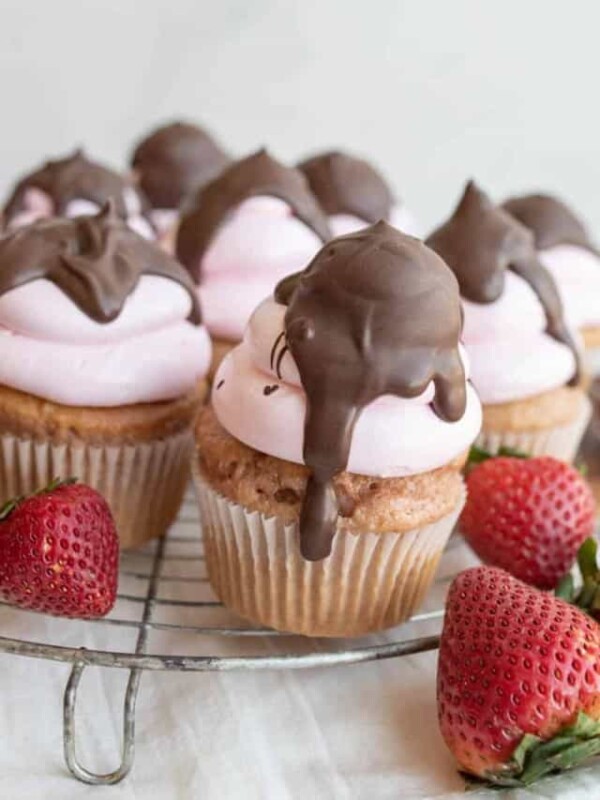 strawberry cupcakes with chocolate on top