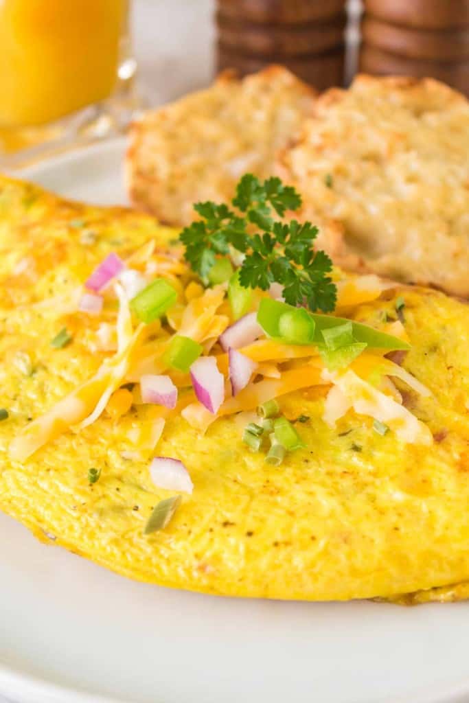 cooked denier omelet served with toast