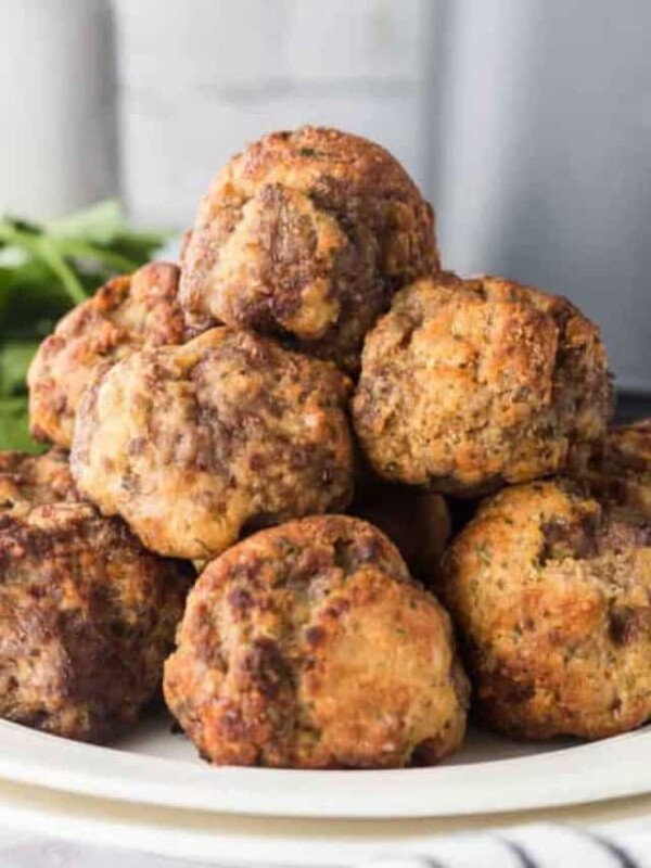 air fryer meatballs stacked on a plate