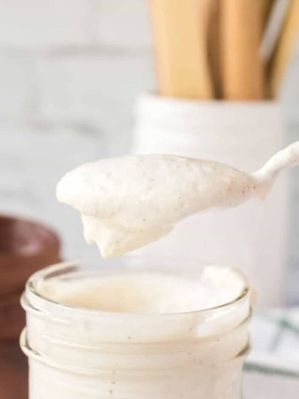 horseradish sauce spooned out of a mason jar