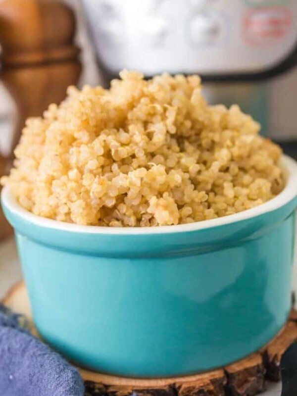 a turquoise dish of instant pot quinoa