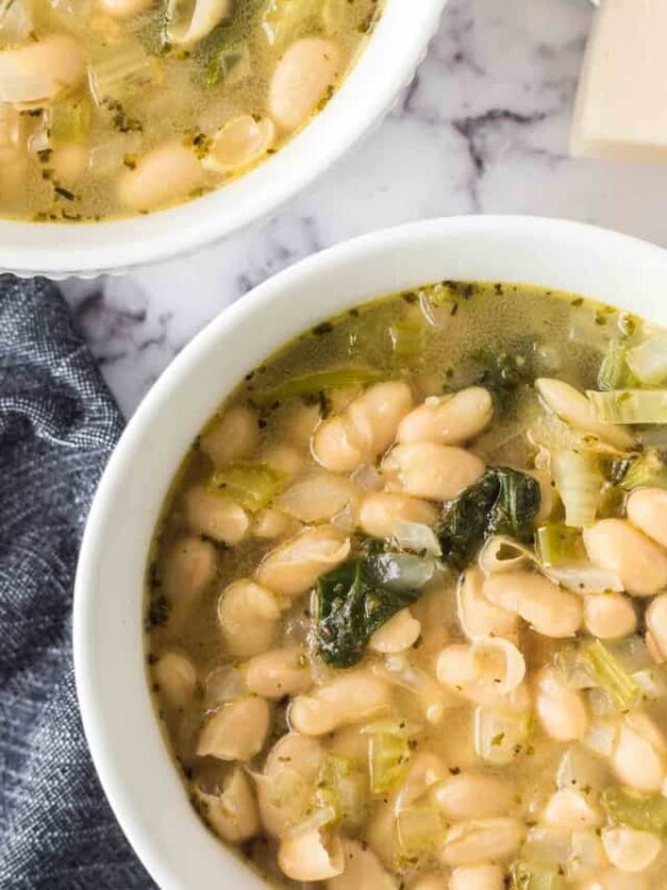 white bean soup in white bowls