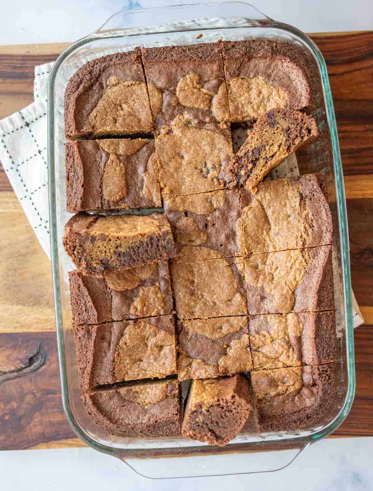 baking dish of baked and cut brookies.