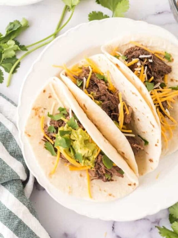 barbacoa tacos on a plate