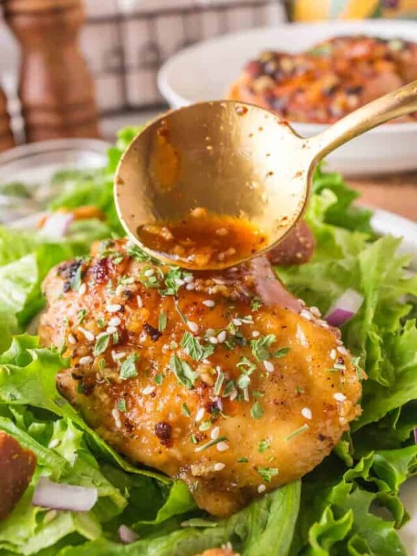 honey garlic chicken thighs over lettuce