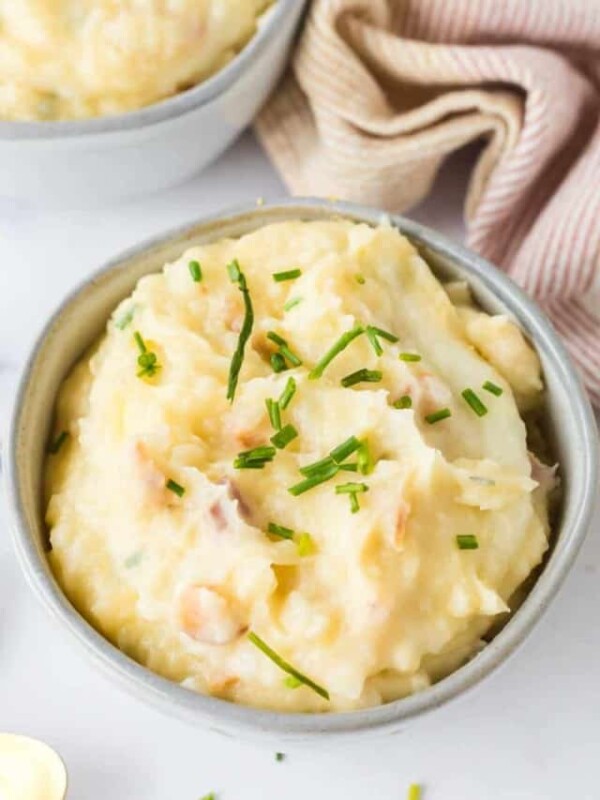 loaded mashed potatoes in a small serving bowl