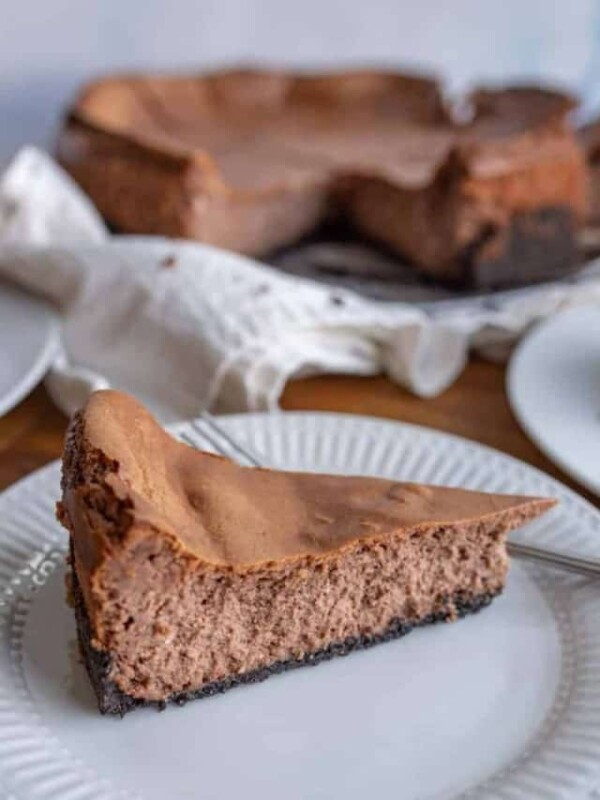 Side view of a slice of chocolate cheesecake