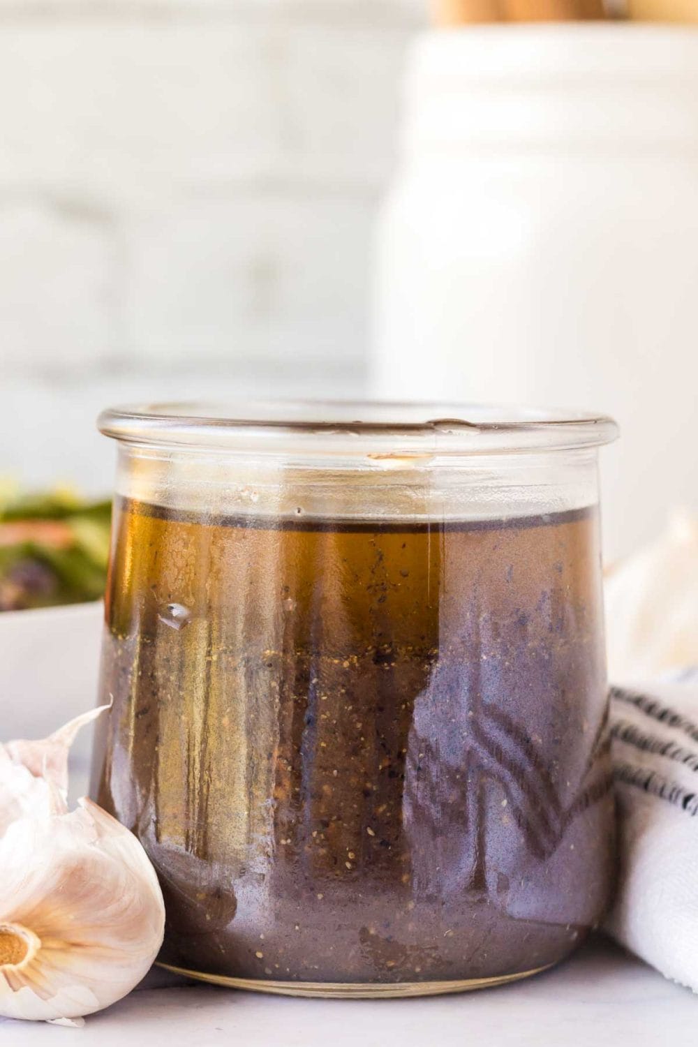 small glass jar with balsamic vinaigrette