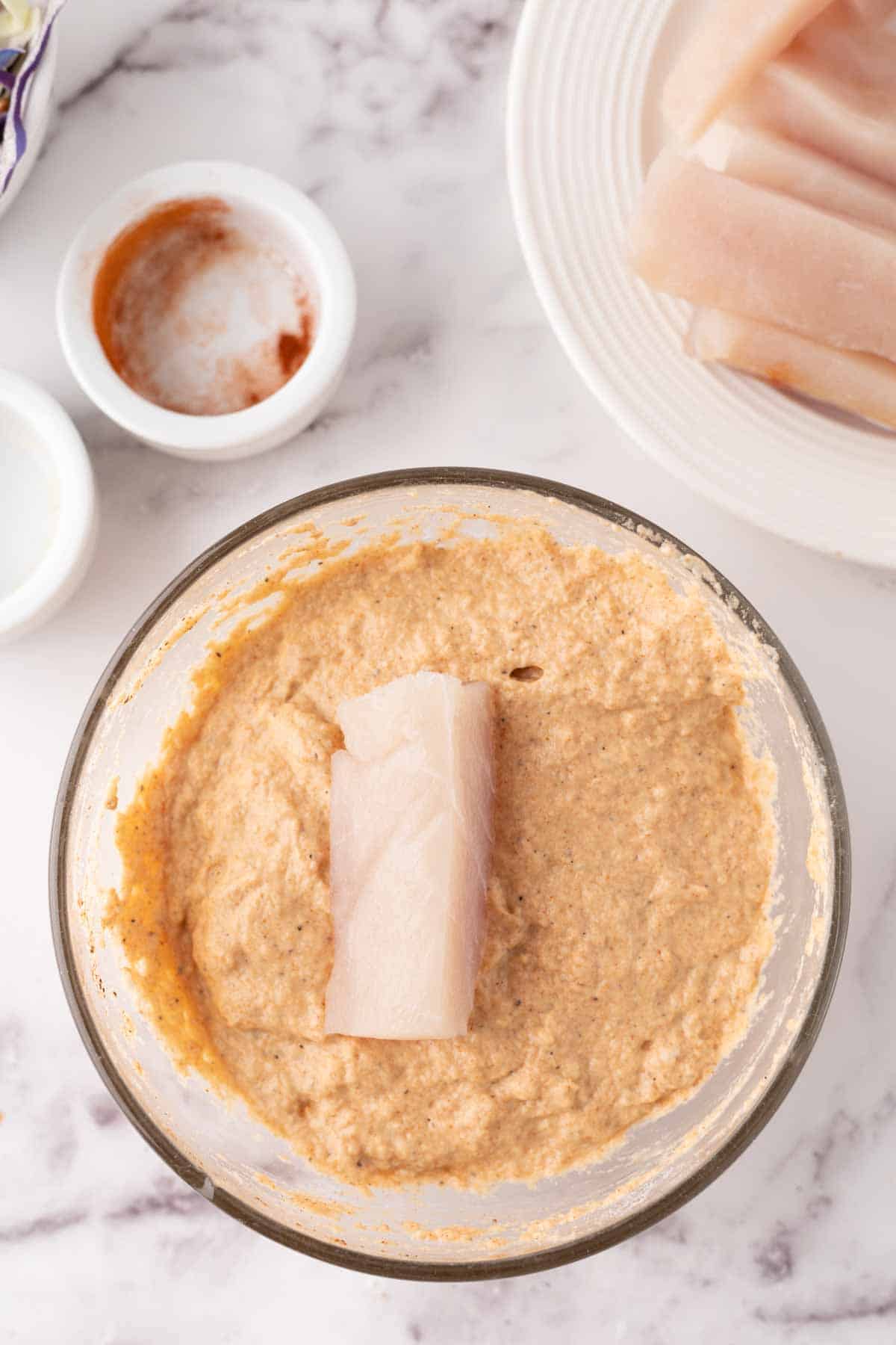 mixing bowl with batter to dip the fish for baja fish tacos.