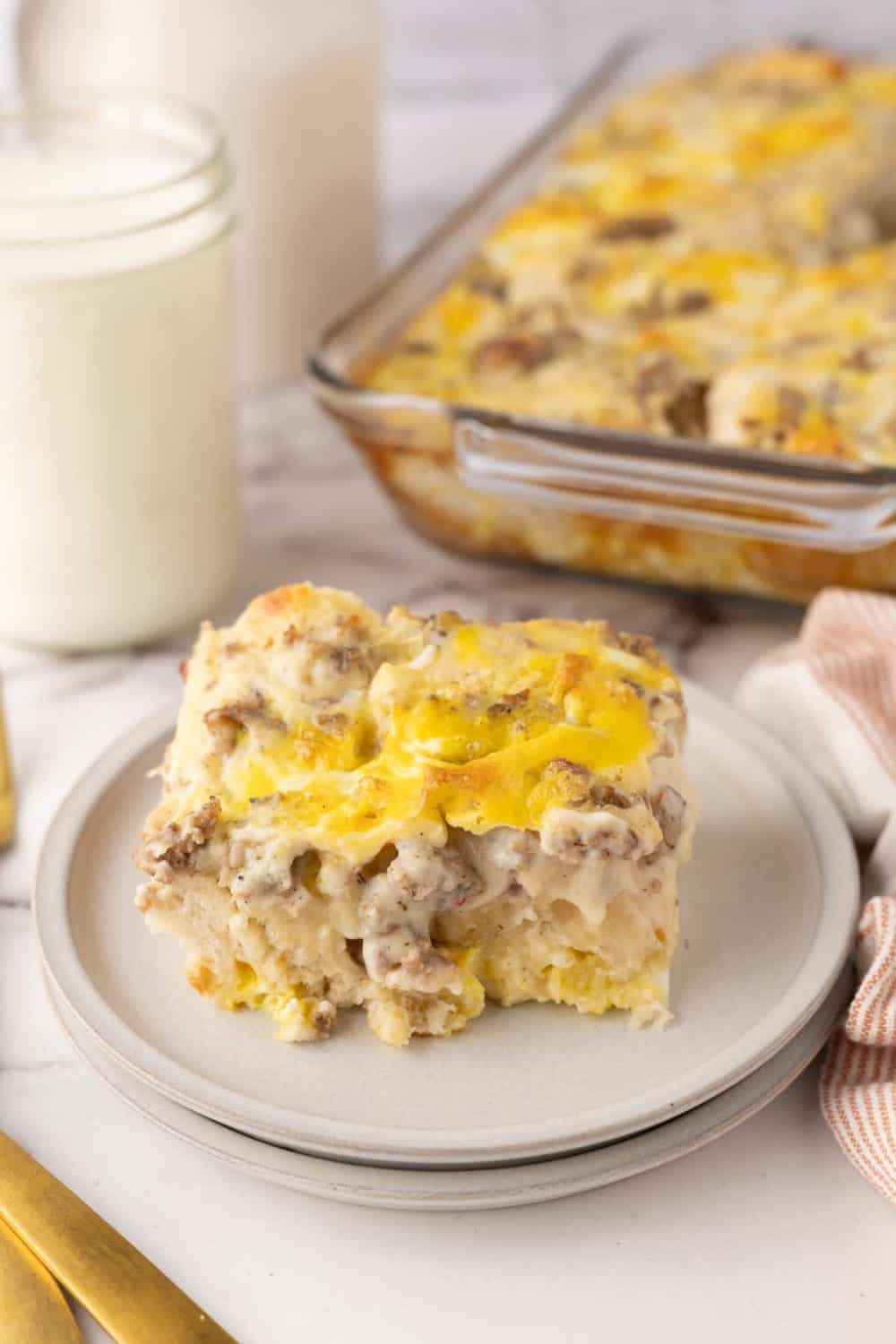 biscuits and gravy casserole recipe served on a round plate.