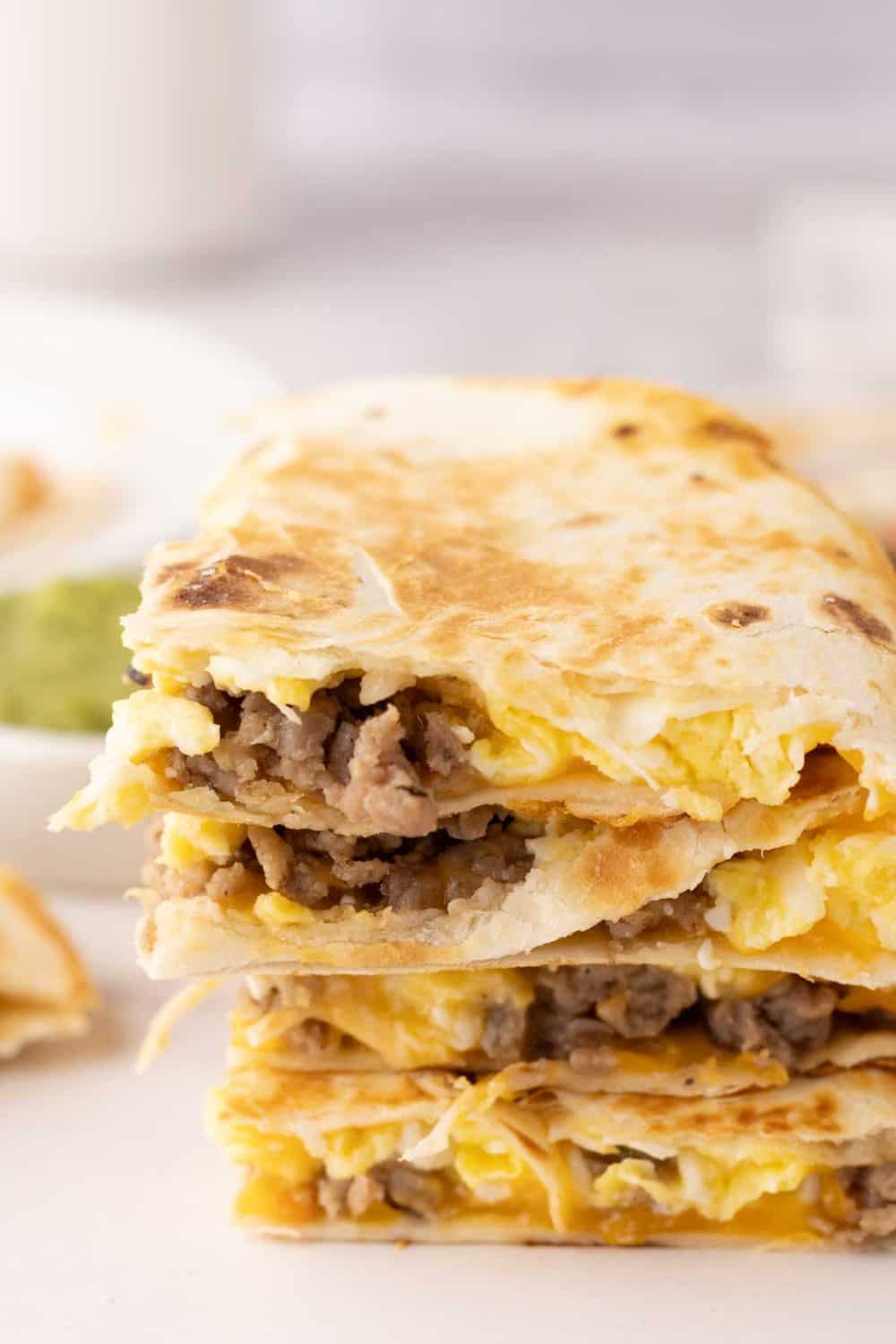 stack of triangle servings of breakfast quesadillas.