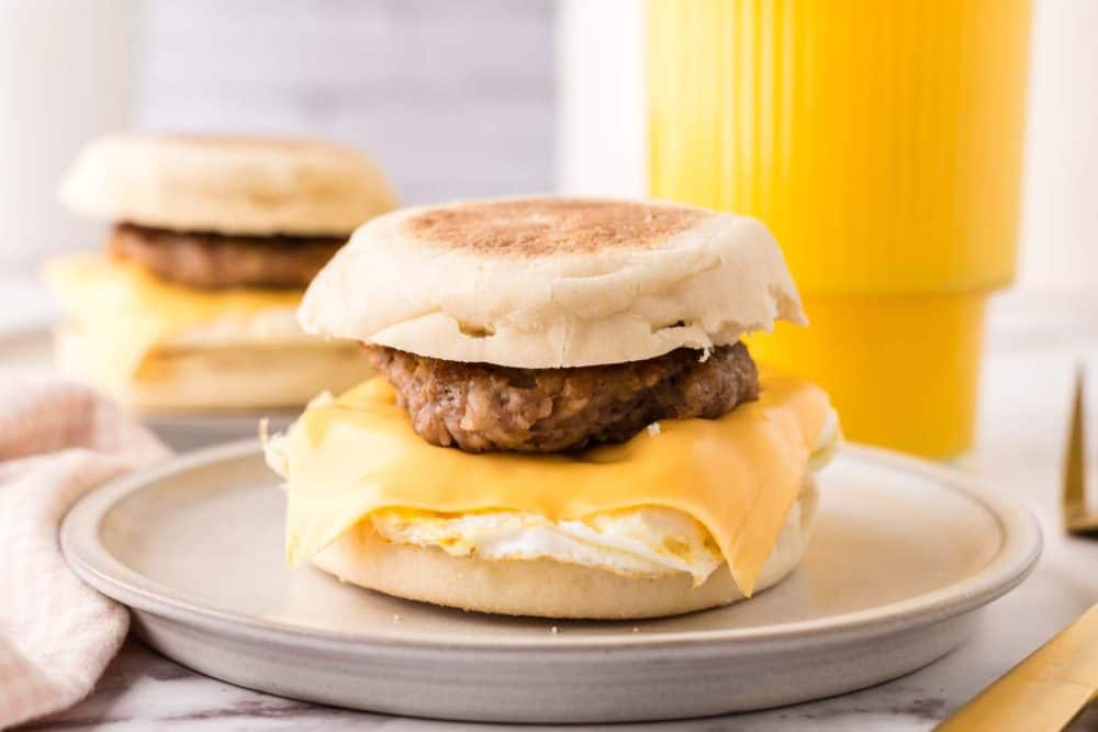 English muffin egg and sausage breakfast sandwich.