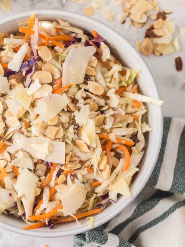 cabbage salad recipe in a white bowl.